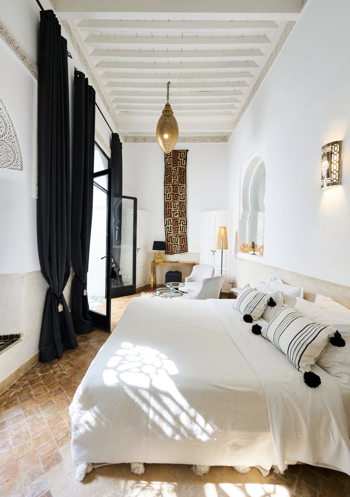 Room with pool and patio view