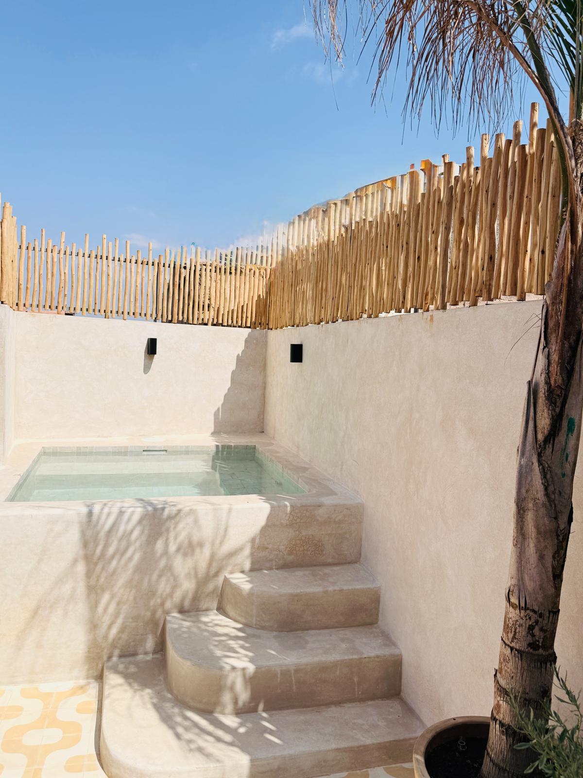 Luxury rooftop pool at Riad Rafaele & Spa, boutique hotel in Marrakech Medina